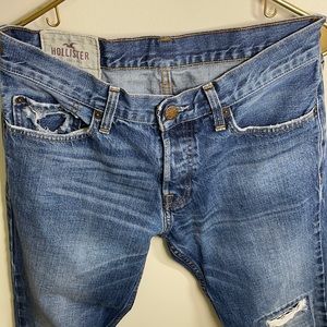 Hollister jeans, ripped on the knees.